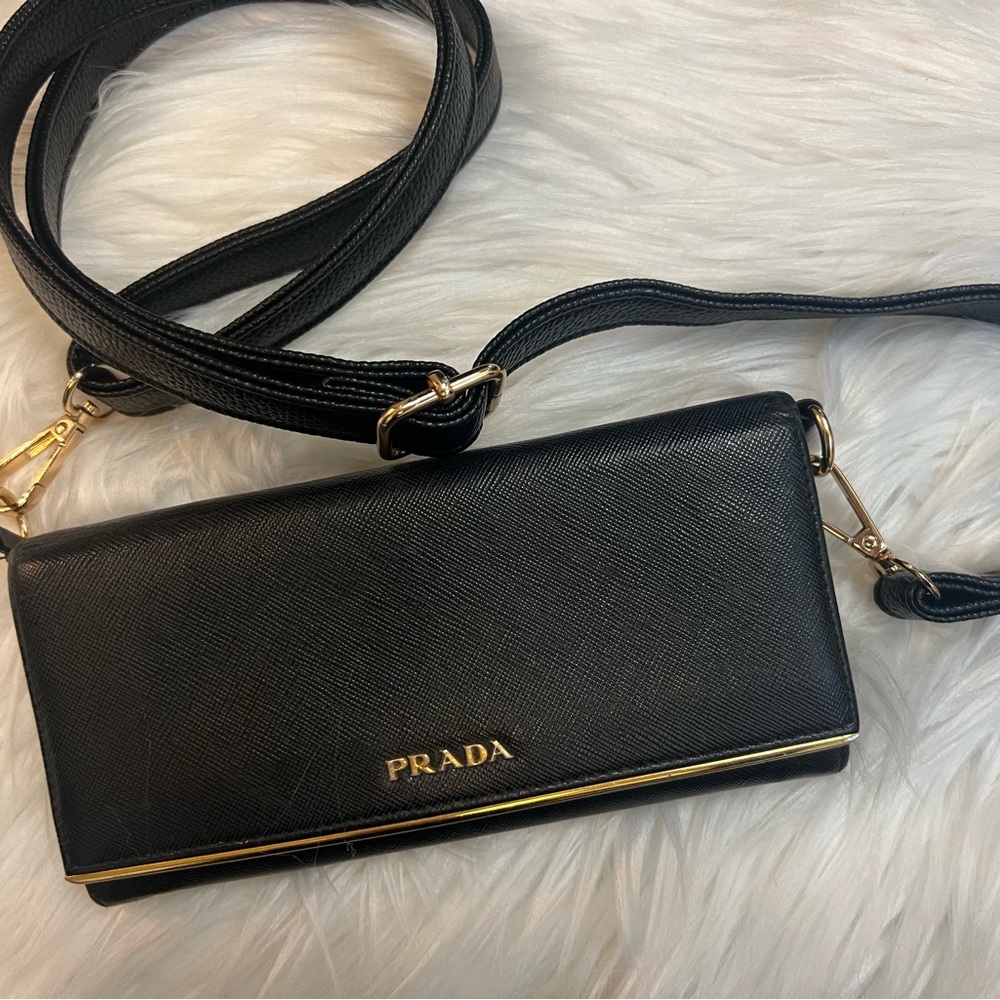 Prada black leather long wallet on chain ( adjustable strap). w gold hardware